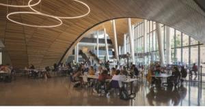 The Charles Library's central atrium is active 24 hours a day and offers computer workstations for the greater community, largely underserved by Philadelphia's public library system. | Image: Michael Grimm Photography