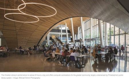 The Charles Library's central atrium is active 24 hours a day and offers computer workstations for the greater community, largely underserved by Philadelphia's public library system. | Image: Michael Grimm Photography